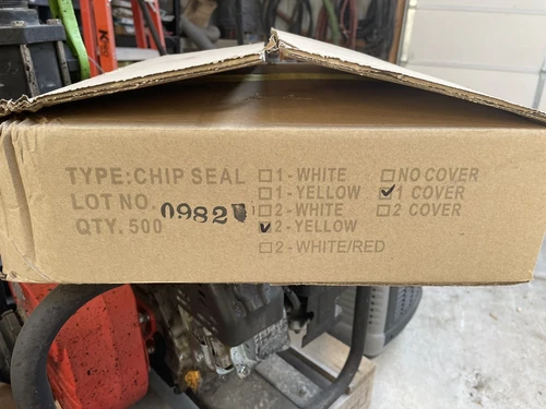 Temporary Chip Seal pavement marker - APEX yellow 2 sided 0982 1 Cover QTY 500 - product listing photo