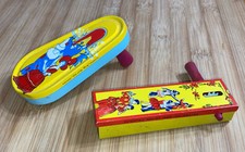 2 Antique Noise Maker Toy w Circus Dancers Pat. Nov. 27, 1928  Clown Lady Dance
