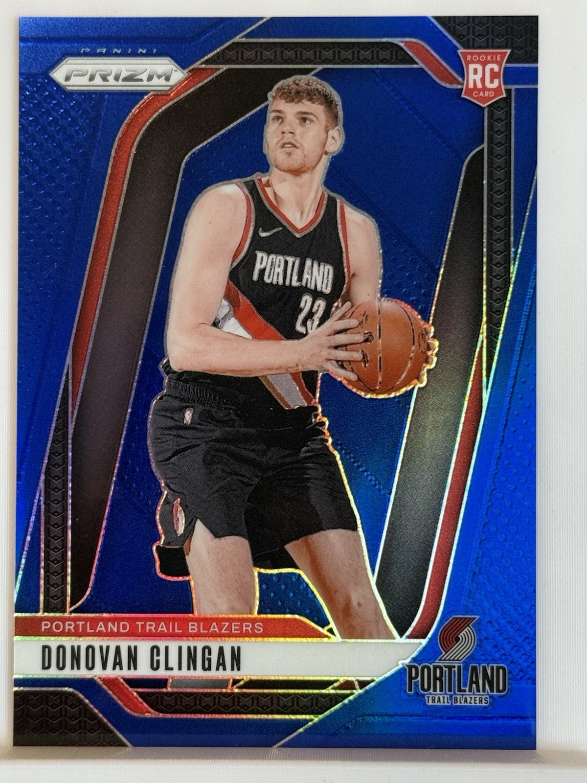 2024-25 PANINI PRIZM - #221 DONOVAN CLINGAN TRUE BLUE PRIZM - /199 (RC)