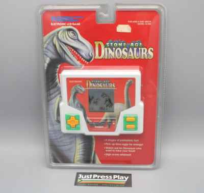 1994 Tiger Electronics Stone Age Dinosaurs Handheld LCD Game NOS New Sealed