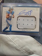2025 Panini National Treasures - Crossover Rookie Patch Autographs Isaac Teslaa