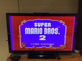 NES CONSOLE WITH DOGBONE CONTROLLERS MARIO 1 2 3 DR MARIO DONKEY KONG CLASSICS