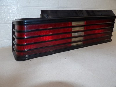 PONTIAC SUNBIRD 2000 1985-1987 4 DOOR SEDAN LH DRIVERS SIDE TAILLIGHT OEM