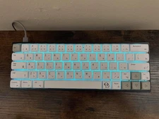 Custom Creamy Keyboard With English and Japanese Key Cap Font and RGB Lighting