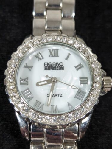 Figaro Milano Womans White Pearlized Dial Crystal Accent Silver Tone Watch 7 In.
