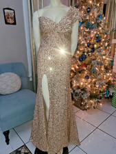 Long, one-sleeved evening dress with gold sequins, size M.