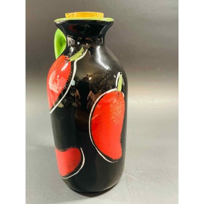 Cute jug with cork plug would go well with your Italian decor. 