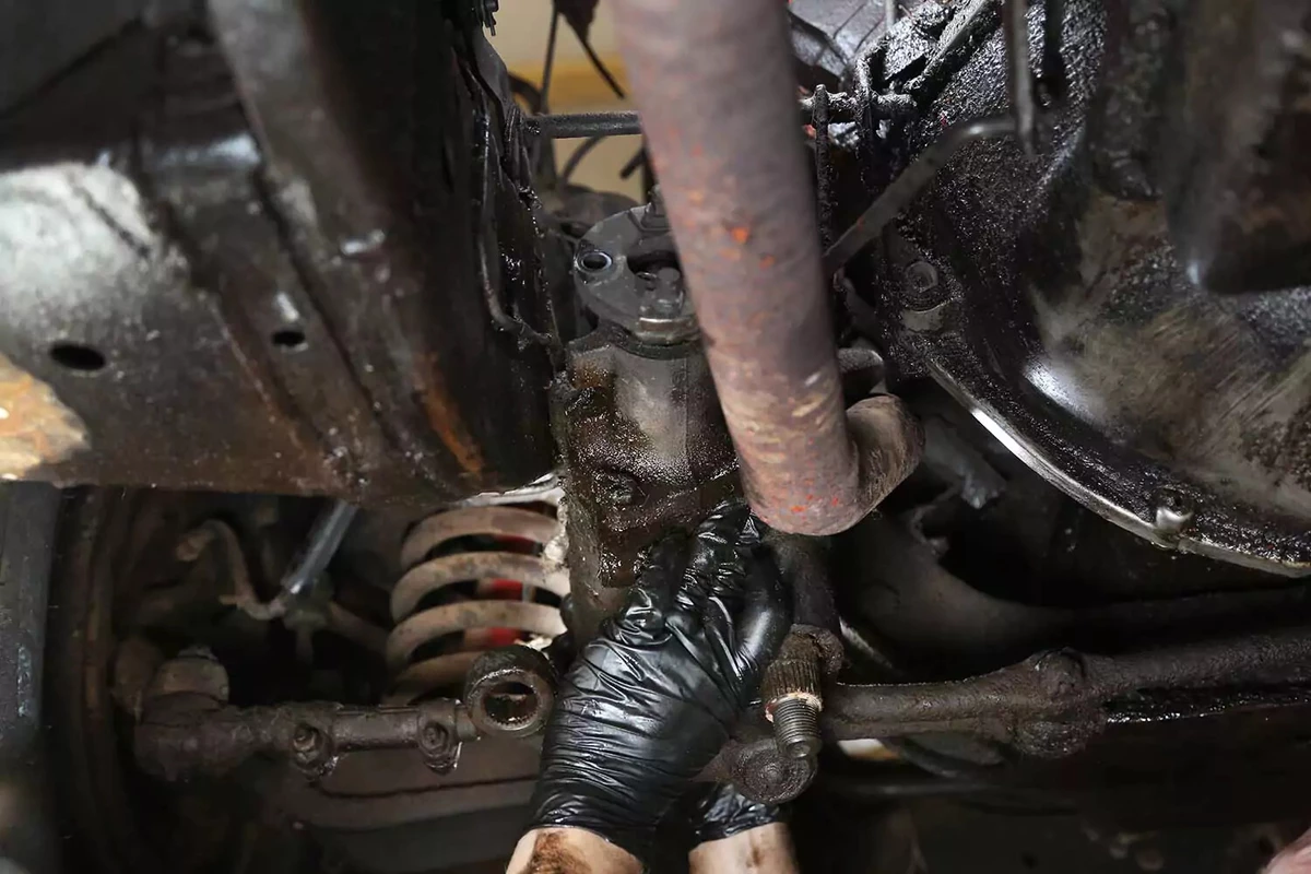 The unbolted gearbox dropped from the chassis.