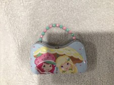 Strawberry Shortcake Tin Scoop Purse 2011 Shaped Pink. Super cute! 8.5 x 5&rdquo; body