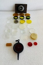 VINTAGE LOT OF CAMERA LENS FILTERS RED GREEN AMBER CLEAR ETC AND OTHER ITEMS