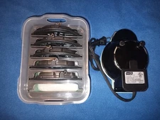 Dash Mini Waffle Maker with 5 Removable Plates and Storage Case used