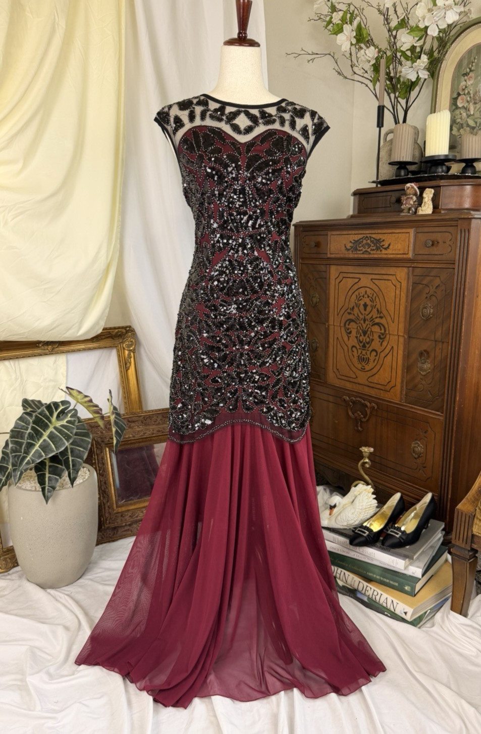 Beaded prom formal elegant black burgundy evening gown glam red carpet ready