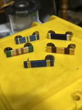 Five Military Service Pins, One Missing Pinback