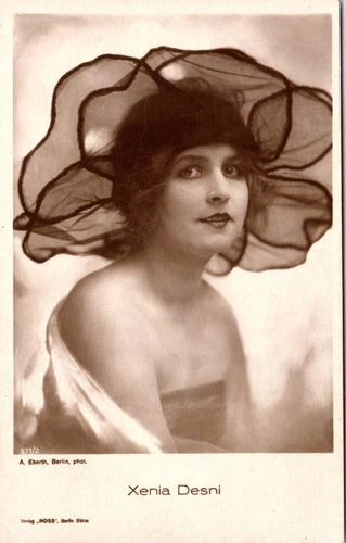 XENIA DESNI : BEAUTIFUL SILENT FILM STAR : RISQUE : UNIQUE HAT : RPPC - Picture 1 of 3