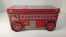 Rare Fire Truck TIN With Lid And Spinning Wheels. 1 Dalmatian 3 Firefighters