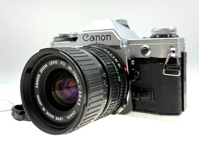 *Gut* Canon AE-1 analoge Spiegelreflexkamera silber mit NFD 35-70mm F3.5-4.5 ...
