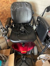 JAZZY POWER CHAIR SCOOTER NEEDS CHAIR BUT CHAIR USABLE RED