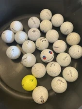 25 Golf Balls mixed brands: Titleist, Taylor-Made, And Calloway.