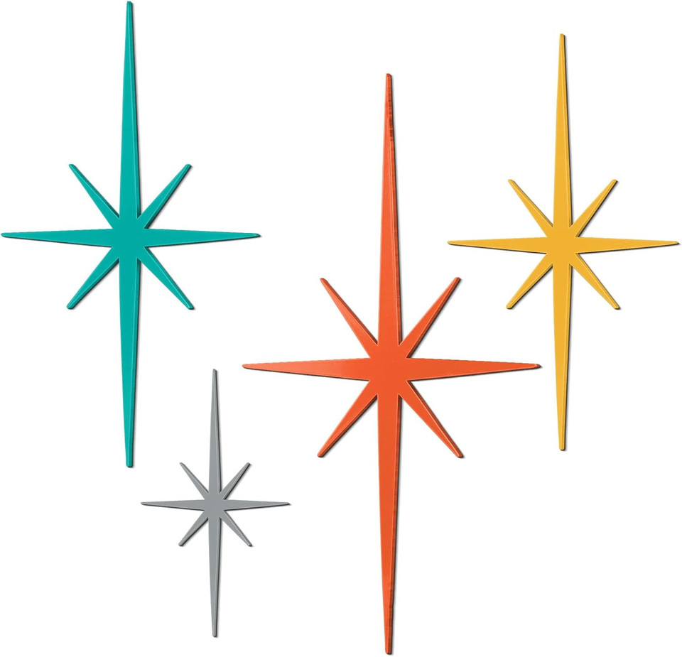 A set of 4 cast-iron starburst wall pieces is legit mid-century modern design language — tactile, heavy, architectural, and increasingly hard to find new.