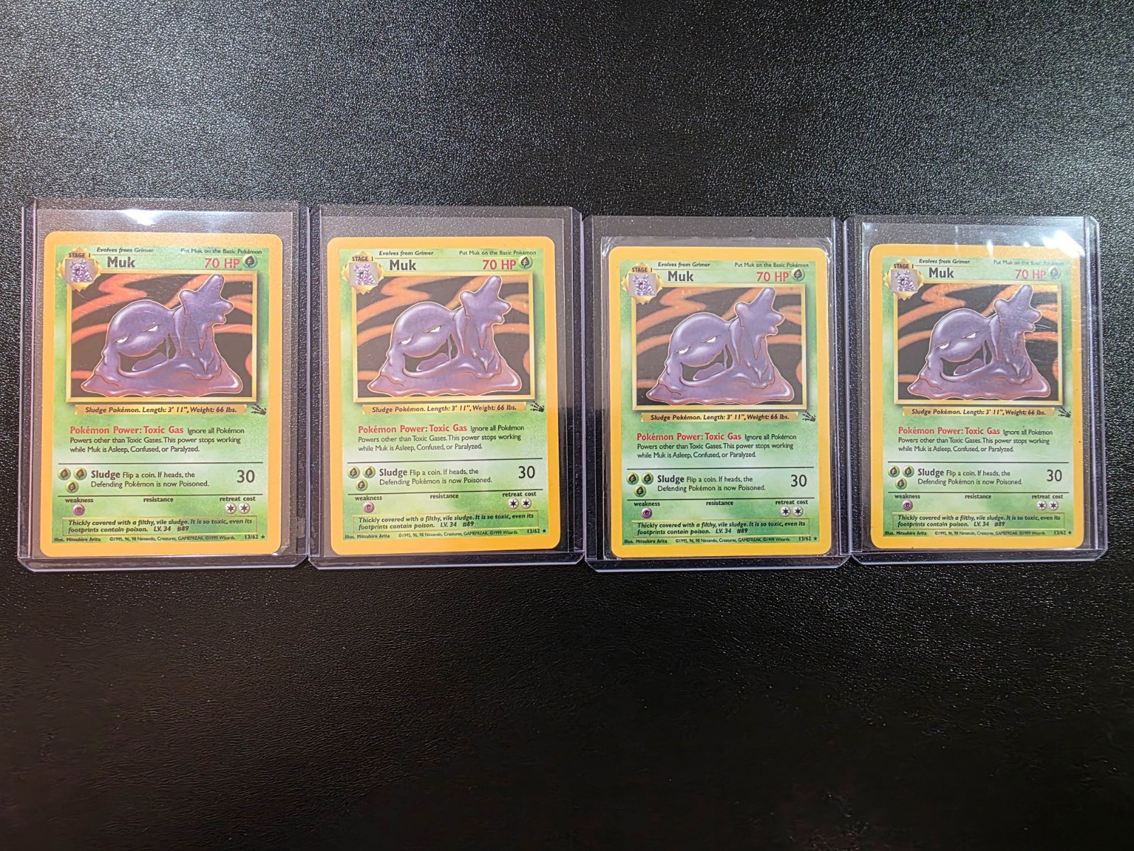 1999 Pokemon Fossil #13 Holo Muk NM