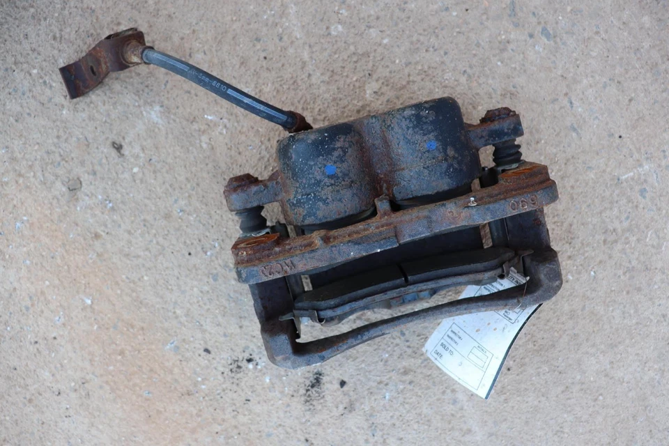 Pinza de freno trasera izquierda del lado del conductor Hummer H2 2003-2009 con manguera OEM Foto 2 de 3