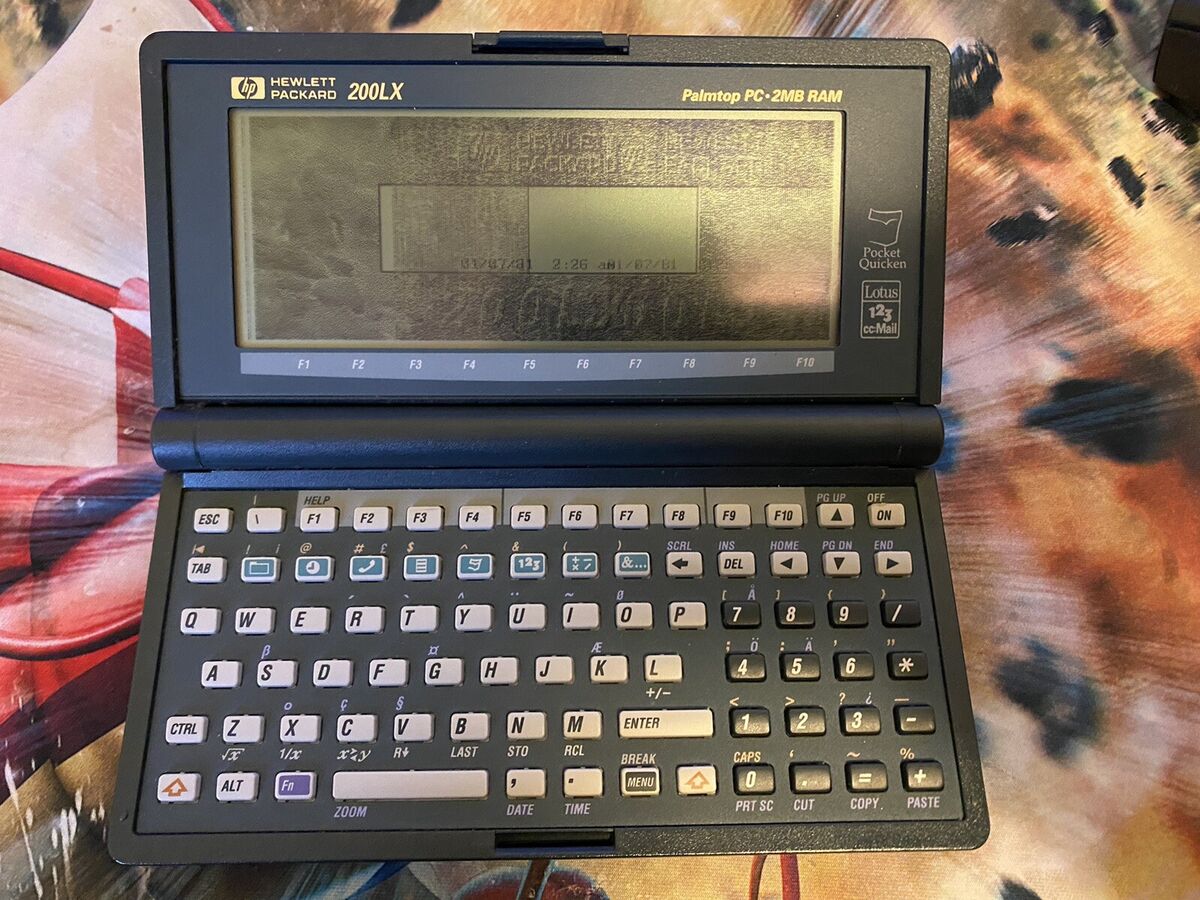 HP Hewlett Packard 200LX Palmtop PC 2mb RAM Case for sale HP Hewlett Packard 200LX Palmtop PC 2mb RAM Case for sale