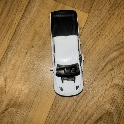 Motormax 2019 Dodge Ram 1500 Crew Cab Rebel 1/43 Scale White Pull Back & Go - Picture 3 of 9