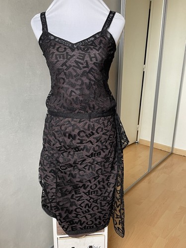 CHANEL Gorgeous Monogram Logo Skirt And Top. Very Rare model. Vintage.