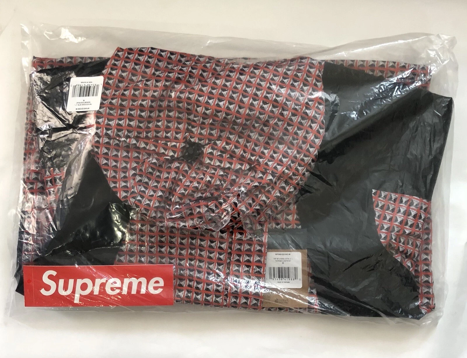 Veste de montagne cloutée Supreme The North Face rouge   taille moyenne