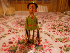 Vintage Tin Toy GI Joe holding 2 K-9 Pups Wind Up Litho Toy in working condition