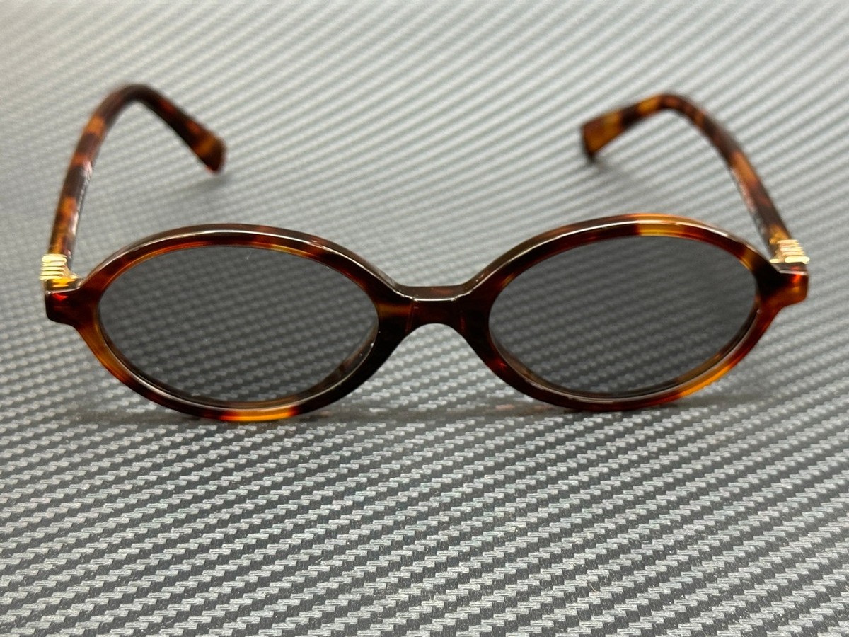 Miu Miu MU04ZS 21C40O Sunglasses Havana Mahogany Oval Frame, Grey Lenses Miu Miu NEW MIU MIU MU04ZS VAU07F HAVANA SILVER SUNGLASSES  main image 2