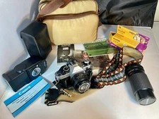 Canon AE-1 Program 35mm SLR Film Camera with 50mm 1:1.8 lens Bundle W/ Bag/Film