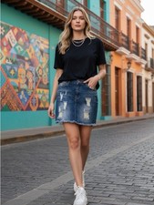 Minifalda vaquera envejecida de jean de cera azul dobladillo deshilachado S