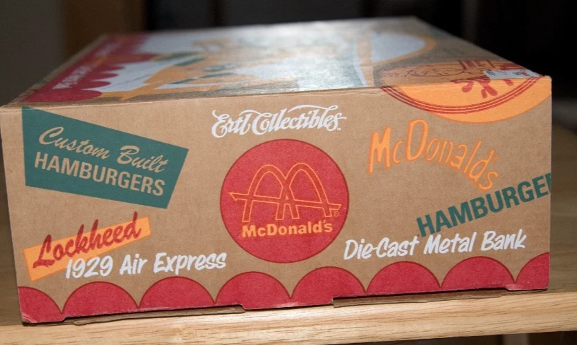 Banco de monedas fundidas a presión McDonald’s Lockheed 1929 Air Express 1996 vintage con orig. Caja Foto 2 de 4