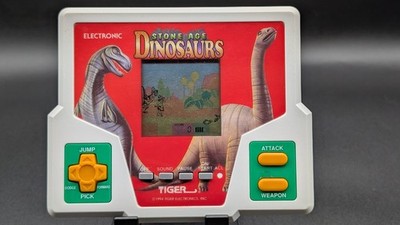 1988 Tiger Electronics Stone Age Dinosaurs Handheld LCD Game(Tested)