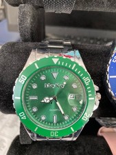 Rolex Submariner style with green face and bezel