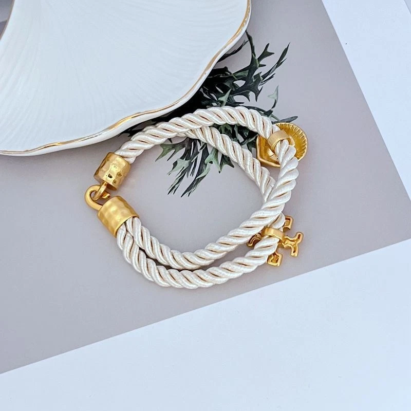 ¡Nuevo! Pulsera de cuerda con logotipo Tory Shell marfil con bolsa de joyería tamaño: 19 cm Foto 2 de 3