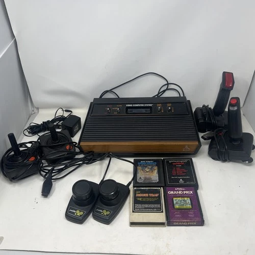 Atari 2600 Console, 4 Video Games, 4 Joysticks, Paddles Controllers, Cord, VTG