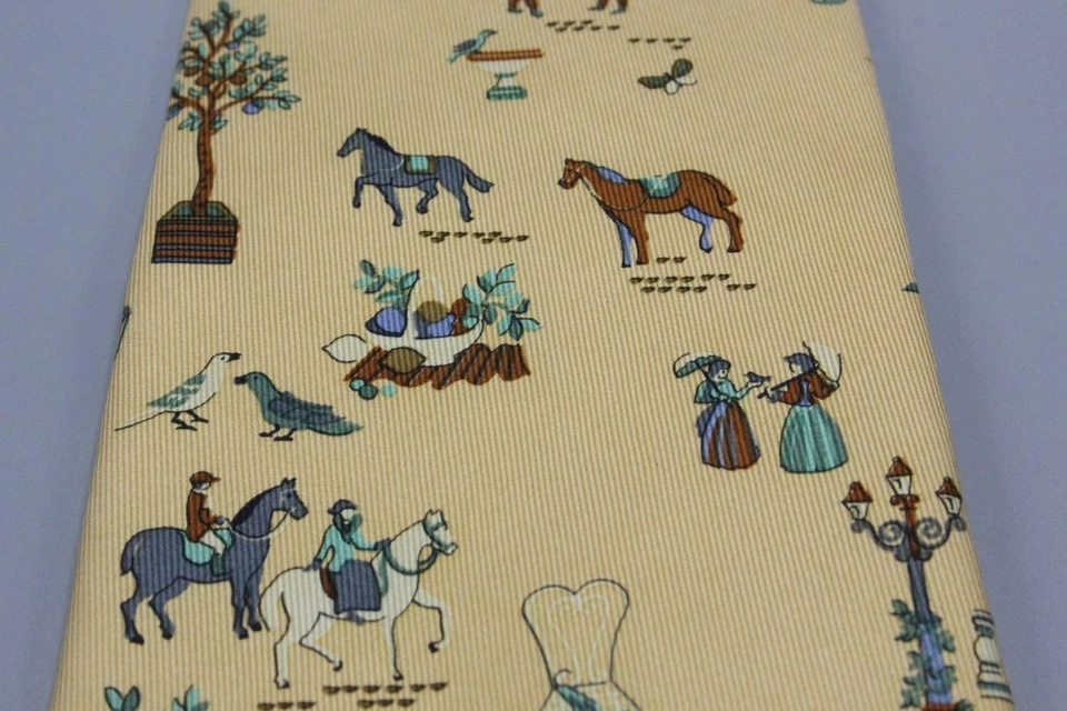 Corbata SALVATORE FERRAGAMO. Marrón claro con pájaros ecuestres malabaristas época victoriana Foto 3 de 4