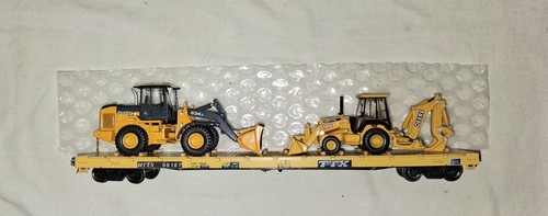 2 cargadoras John Deere HO Walthers 60' Flat Car MTTX#98187 | Condition: Used