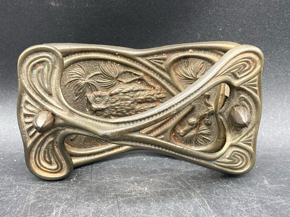 An antique brass Art Nouveau ink blotter — a functional relic of pre-ballpoint writing culture with sinuous, museum-worthy detailing.