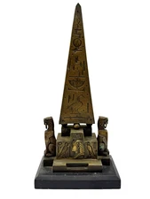 Egyptian Revival Art Deco Bronze Cast Obelisk and Lions On Black Stone Base