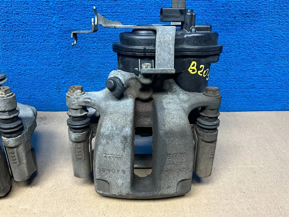 💎2016 - 2019 BMW 740i G11 G12 Juego de pinzas de freno traseras izquierda y derecha OEM 67 k Foto 3 de 4