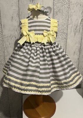 Babykleidung Handarbeit UK, hübsches Mädchen gelb grau und weiß Kleid