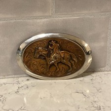 Vintage Bronze  silver tone western belt buckle with cowboy on horseback