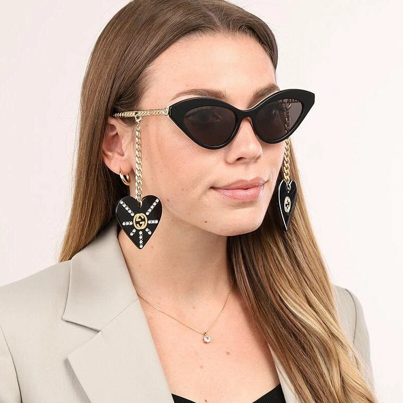 Nuevas gafas de sol Gucci para mujer GG0978S ojo de gato negras/doradas 52-140 cadena corazón Italia Foto 2 de 4