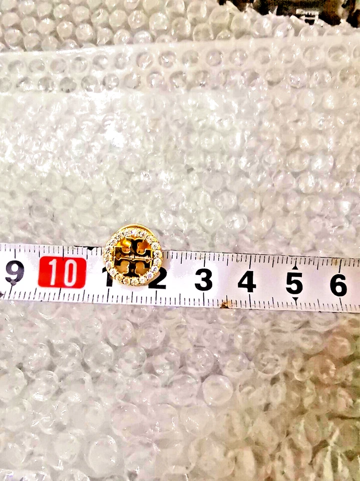 Pendientes de oro redondeado Tory Burch Foto 3 de 3