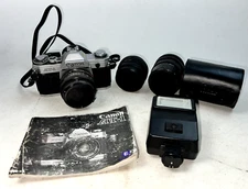 Vintage Canon AT-1 35mm Film Camera with 50mm Lens and Other Accessories