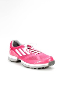 white adidas with pink stripes