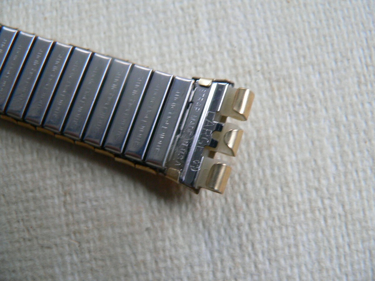 Swatch Watch Flex Metal 17mm - large Swatch Watch Flex metal band 17 mm Gold tone with blue charm  main image 2